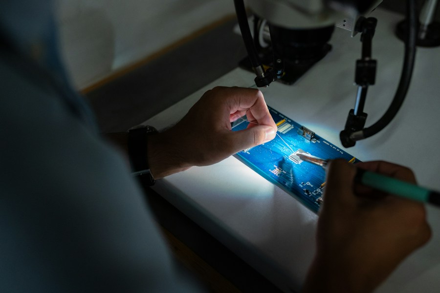 Technician diagnosing electrical equipment